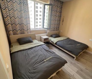 Almaty Apartamento | Оранжевая семья橙子民宿
