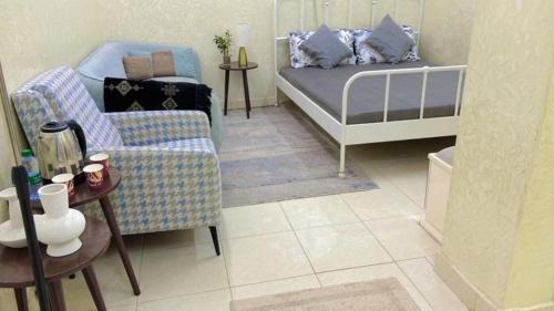 Buraydah Apartamento | استديو انيق بجلسة جانبية مستقل