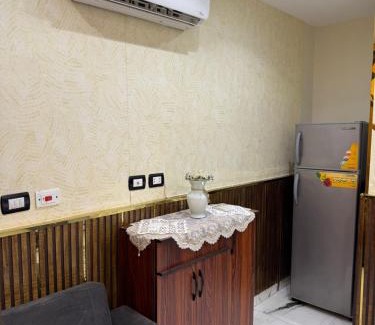Al Duqqi Apartamento | استديو فندقي بالعجوزة