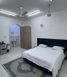 Nizwa Apartamento | الذهب الزرق للشقق الفندقية فرق