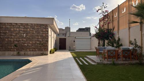 Al Qassim Chalet De Esquí | شاليه نيفا الفندقي