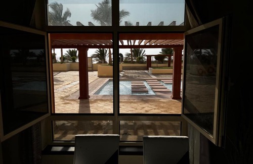 Bay La Sun Apartamento | كوخ الشاطئ