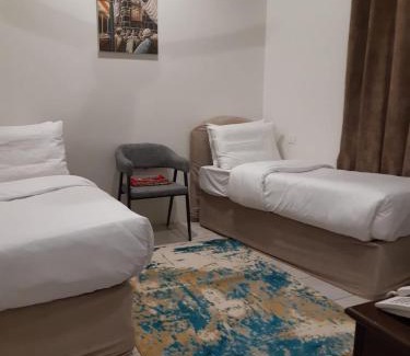 Mecca Casa | مكة المكرمة غرف عائلية فندق بجوار الحرم تخفيضات للمجموعات ناحية برج الساعة Makkah room in HOTEL near ALHARAM Multiple ROOM