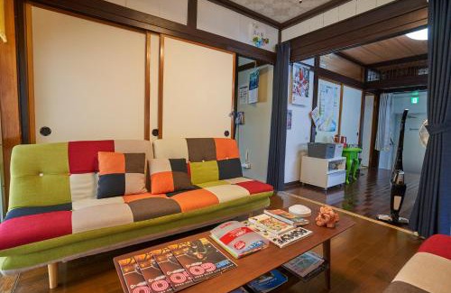 Nakasonecho Apartamento | コザを楽しむ一軒家 Kaeruhouse