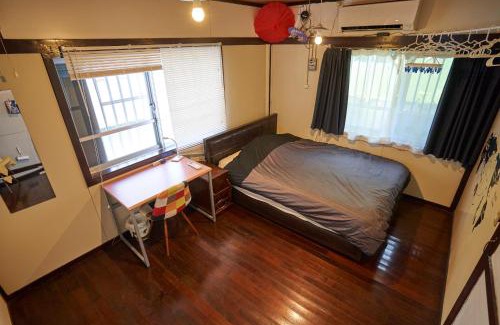 Nakasonecho Apartamento | コザを楽しむ一軒家 Kaeruhouse