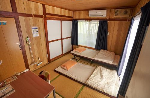 Nakasonecho Apartamento | コザを楽しむ一軒家 Kaeruhouse