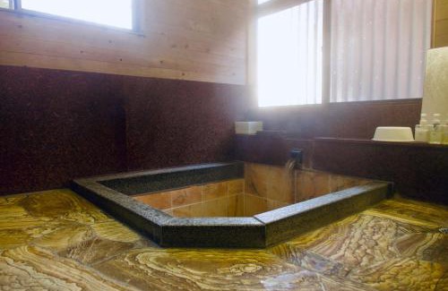 Azumino Casa | 天然温泉付き プライベート空間 北アルプスの麓安曇野 貸切一棟貸 70型スクリーン完備 フモトノイエ