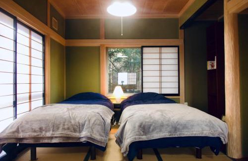 Azumino Casa | 天然温泉付き プライベート空間 北アルプスの麓安曇野 貸切一棟貸 70型スクリーン完備 フモトノイエ