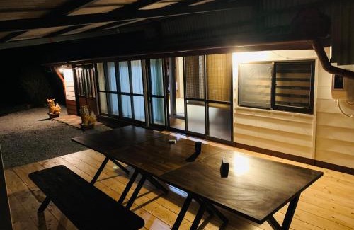 Nago Casa | 広い畳間と外には広いウッドデッキCondominium和風邸Yanbaru