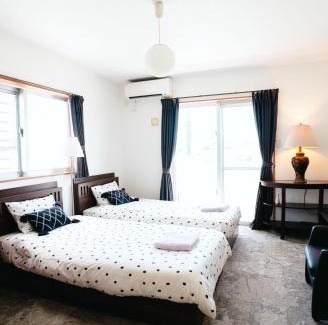 Kadena-cho Apartamento | 座喜味宿泊#コンビニすぐ#バス停1分#便利立地#世界遺産-座喜味城跡まで車5分#残波灯台まで車15分