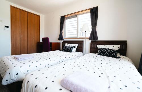 Kadena-cho Apartamento | 座喜味宿泊#コンビニすぐ#バス停1分#便利立地#世界遺産-座喜味城跡まで車5分#残波灯台まで車15分