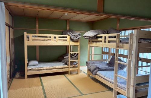 Hoshinooka Casa | 木の家ゲストハウス松山本館
