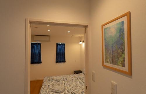 Okinawa Chalet De Esquí | 空港まで車で15分ビーチまで徒歩1分海沿いの閒雲斎