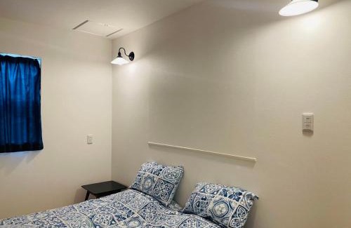 Okinawa Chalet De Esquí | 空港まで車で15分ビーチまで徒歩1分海沿いの閒雲斎