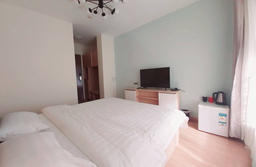 Chengyang Apartamento | 青春球场,世纪公园,青岛国家广告产业园丰富美食