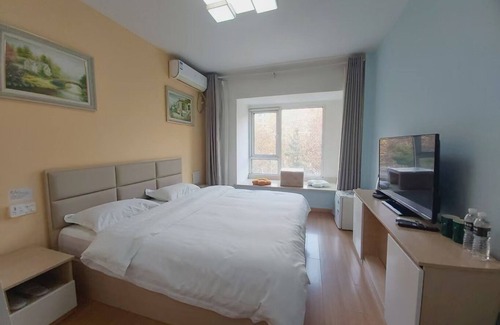 Chengyang Apartamento | 青春球场,世纪公园,青岛国家广告产业园丰富美食