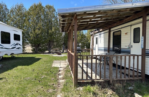 Stokes Bay Casa | #04 Covered Porch with a waterview