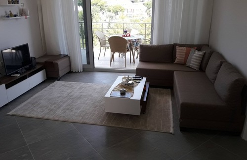 Sogucak Apartamento | Apartamento de lujo 1 + 1 en Kusadasi Sogucak, frente al mar Egeo de color turquesa
