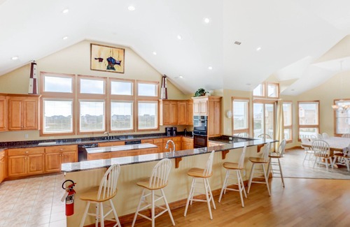 Avon Casa | 1-acre waterfront oasis with pool, hot tubs & sunrise/set views - dog-friendly