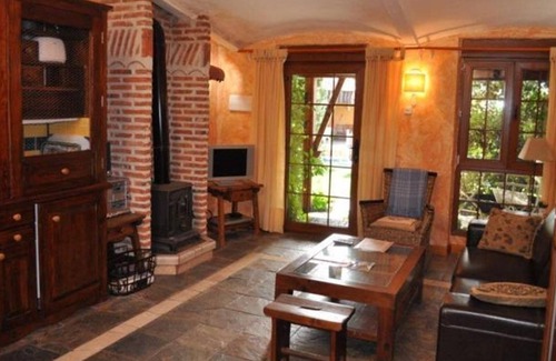 Olmedo Apartamento | Apartamento 1 dormitorio - 4 personas: Con encanto y vistas bonitas al jardín.