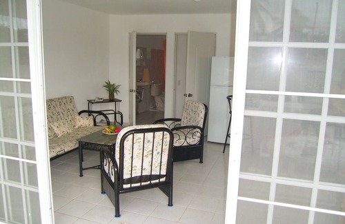Las Galeras Apartamento | Apartamento de 1 dormitorio con sala & cocina, baño, terraza, jardín y piscina