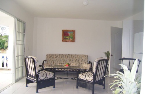 Las Galeras Apartamento | Apartamento de 1 dormitorio con sala & cocina, baño, terraza, jardín y piscina