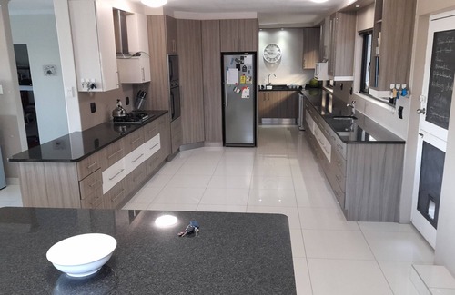 Eikenbosch Casa | 10-12 Sleeper large family home with pool in Bellville, Cape Town