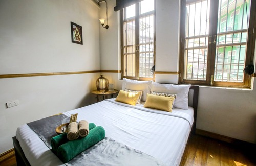 China Town Hotel | 103 - Bed and Brews