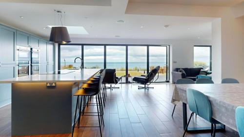 Penrhyn Bay Casa | 105 The Beach House