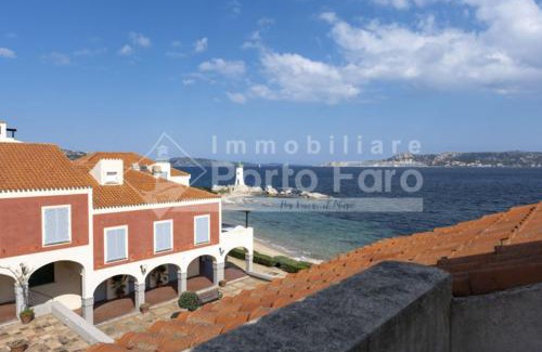 Palau Villa | 12 CENTRO - Trilocale vista mare sul Faro di Porto Faro