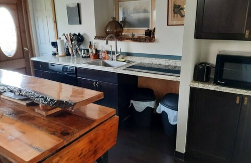 Penfield Otro | 1200 sq.ft. A-frame luxury rustic residence on a golf course.