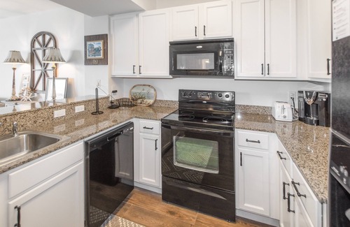 Indian Bayou Condominio | 1411 | Walk to Morgans! Tropical Pools & Amenities Galore!