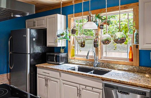 Chimney Rock Casa | 1920s artsy cottage with Chimney Rock views, yard, sauna, & firepit - dogs ok