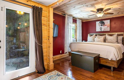 Chimney Rock Casa | 1920s artsy cottage with Chimney Rock views, yard, sauna, & firepit - dogs ok