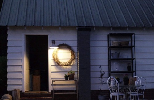 Winston - Salem Cabaña | 1930’s Guest Cottage and Vintage Shop with 1/2 Bath and Full Bed