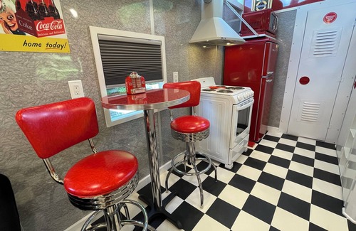 Clyde Complejo | 1950's themed couples caboose on a bison ranch. Pet-Friendly!
