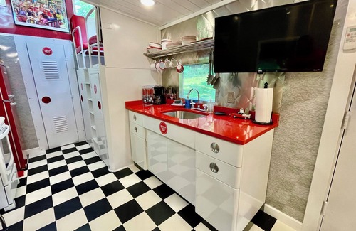 Clyde Complejo | 1950's themed couples caboose on a bison ranch. Pet-Friendly!