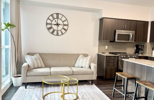 Rexdale Condominio | 1BR+Den Near YYZ with Workspace