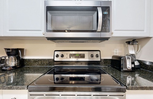 Vaught Condominio | 1st floor condo with pool, tennis, close to beach & golf