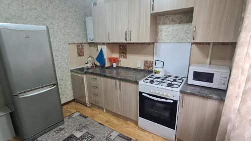 Shymkent Apartamento | 2х-ком Улица 1 Мая дом 1 - 2й этаж