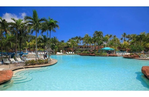 Paradise Island Villa | 2 BDRM LockOff Atlantis Harborside Resort Sleep 8 includes 8 Atlantis Wrist Band