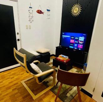 Malamig Apartamento | 2-Bedroom Condotel Stay with Netflix, Kitchen & Washer, Near MRT Boni