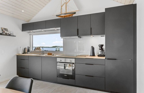 Skarupøre Casa | Acogedora casa de 2 dormitorios en.