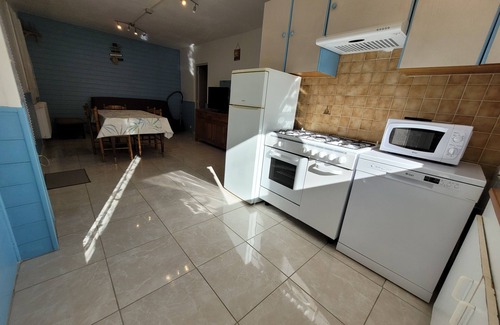 Sarlat-la-Caneda Cabaña | Casa de 2 dormitorios, de 5 a 7 personas. Piscina comunitaria. WIFI gratis.