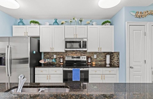 Waterside Village Condominio | 2-bedroom waterfront condo with pool and hot tub in welcoming Mexico Beach