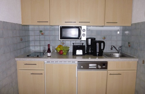 Bodensdorf Apartamento | Apartamento con 2 dormitorios y una maravillosa vista al lago, piscina cubierta y playa privada. Red de internet WiFi gratis