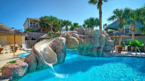 Port Aransas Casa | 2 Blocks to the Beach Patio Resort Pool w Slide Tranquil Tides by AvantStay