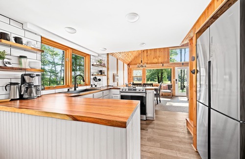 Hayward Casa | 2 cozy, secluded cabins on beautiful waterfront acreage with epic game room