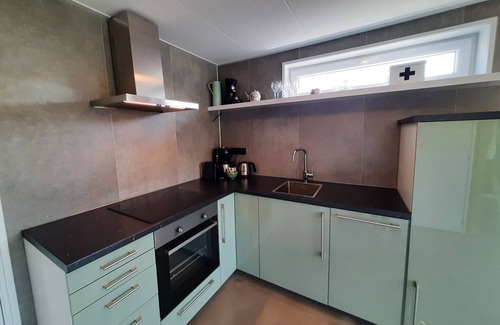 Dirkshorn Casa | 2 huizen naast elkaar honden welkom omheinde tuin 10 km strand, sauna, buitenbad
