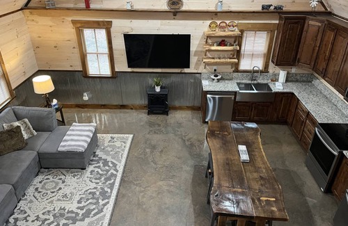Rising Fawn Cabina | 2 Mountain Cabins - Each with a hot tub, fire pit and covered patio - putting green & corn hole